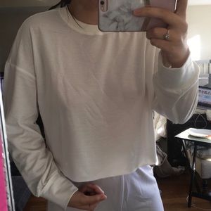 White raw cut cropped pullover. Size M